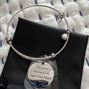 Silver Bangle Bracelet with Engraved Charm